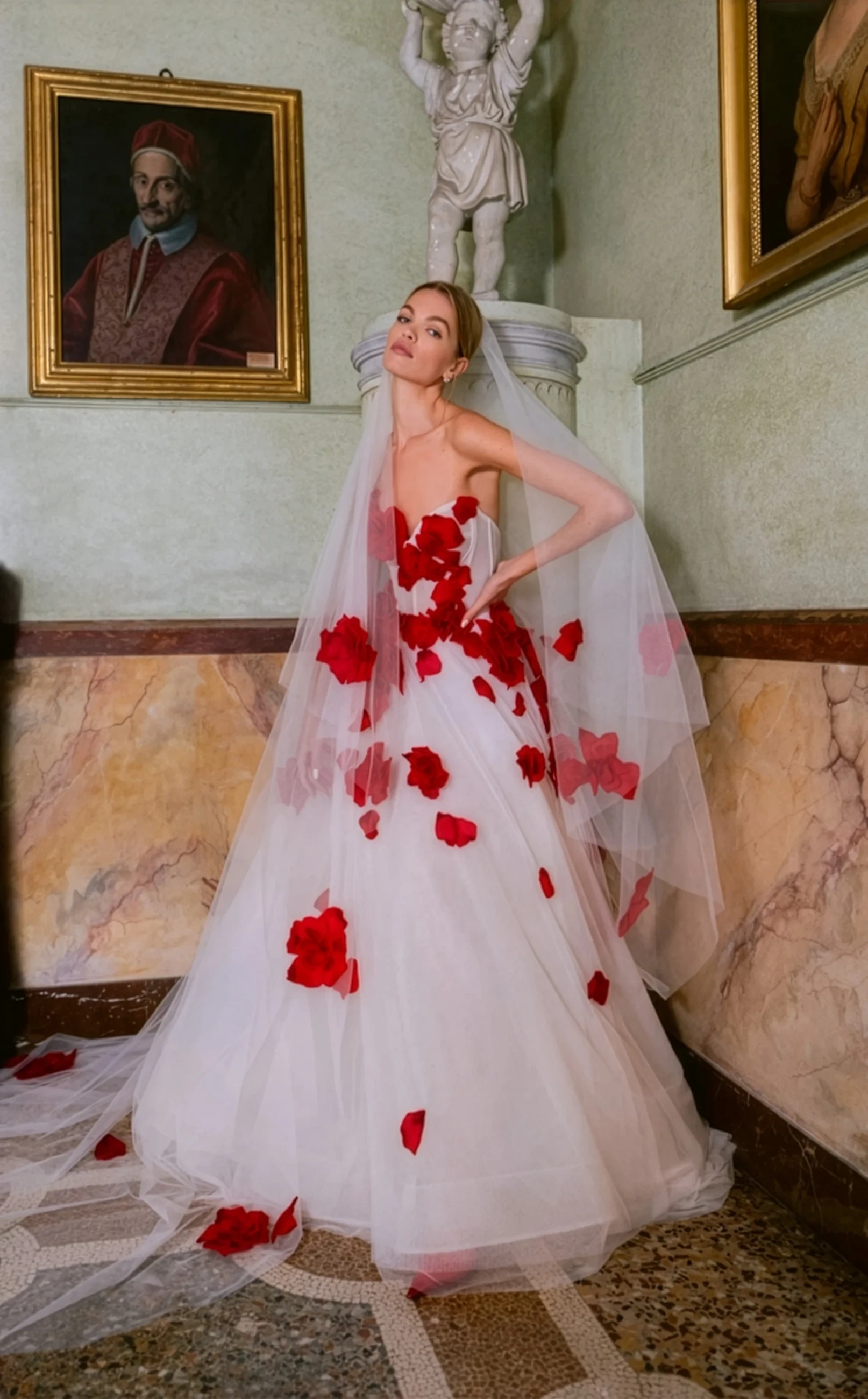 Photo of the model wearing a white bridal gown